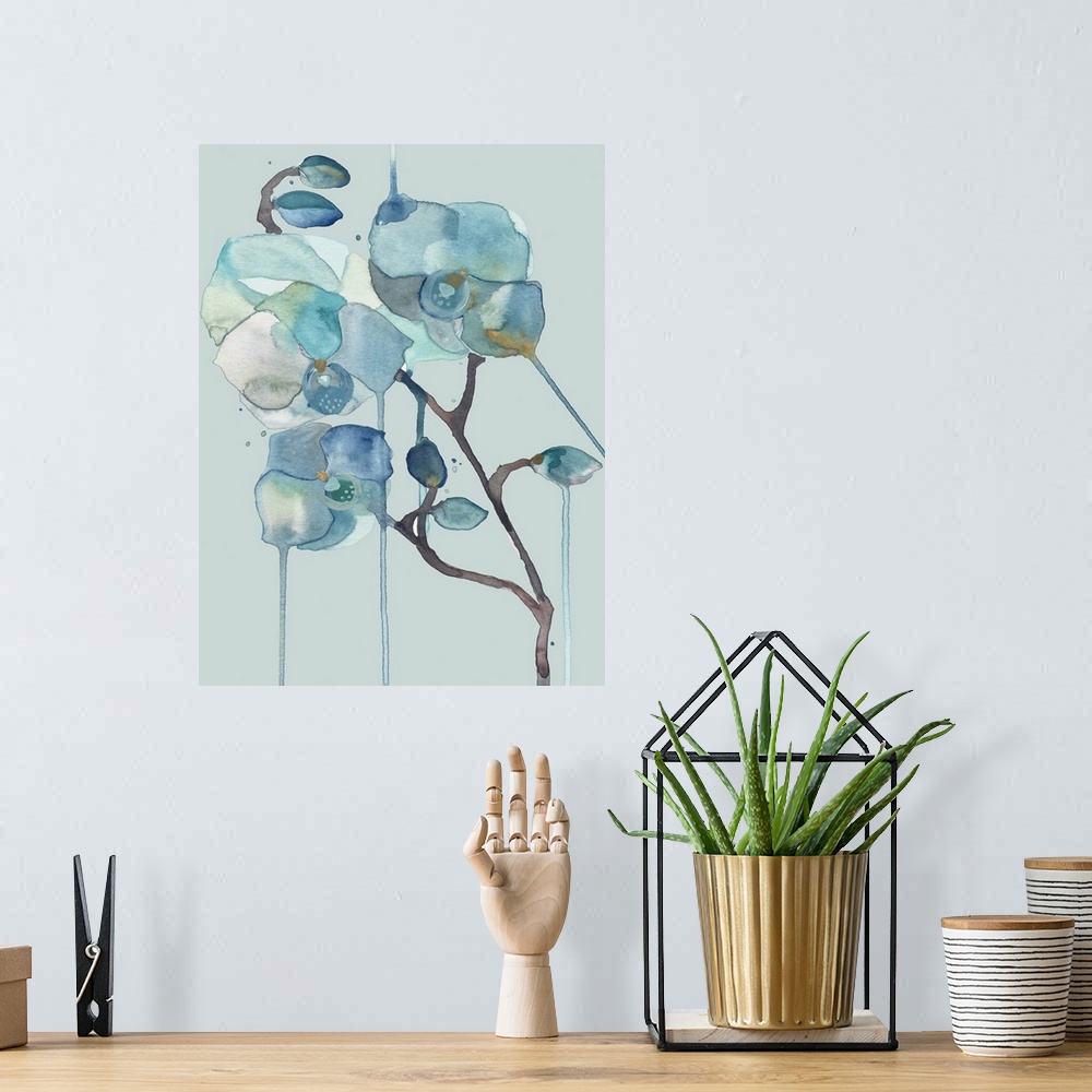 A bohemian room featuring Contemporary watercolor artwork of delicate blue orchid flowers on a light blue background.