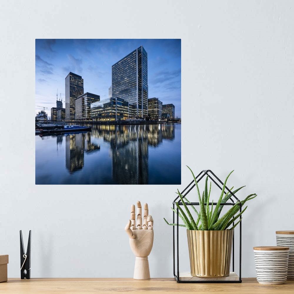 A bohemian room featuring Canary Wharf at dusk, Docklands, London, UK