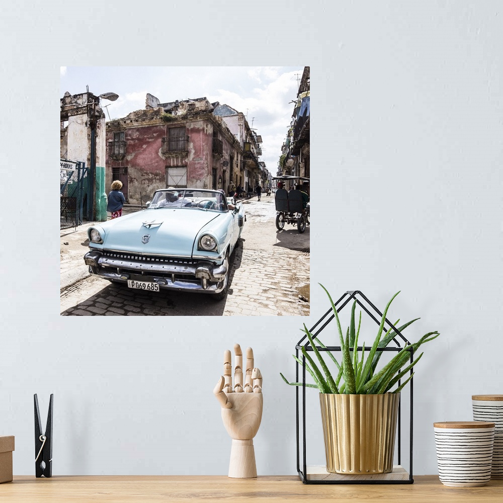 A bohemian room featuring Classic American car , Habana Vieja, Havana, Cuba.