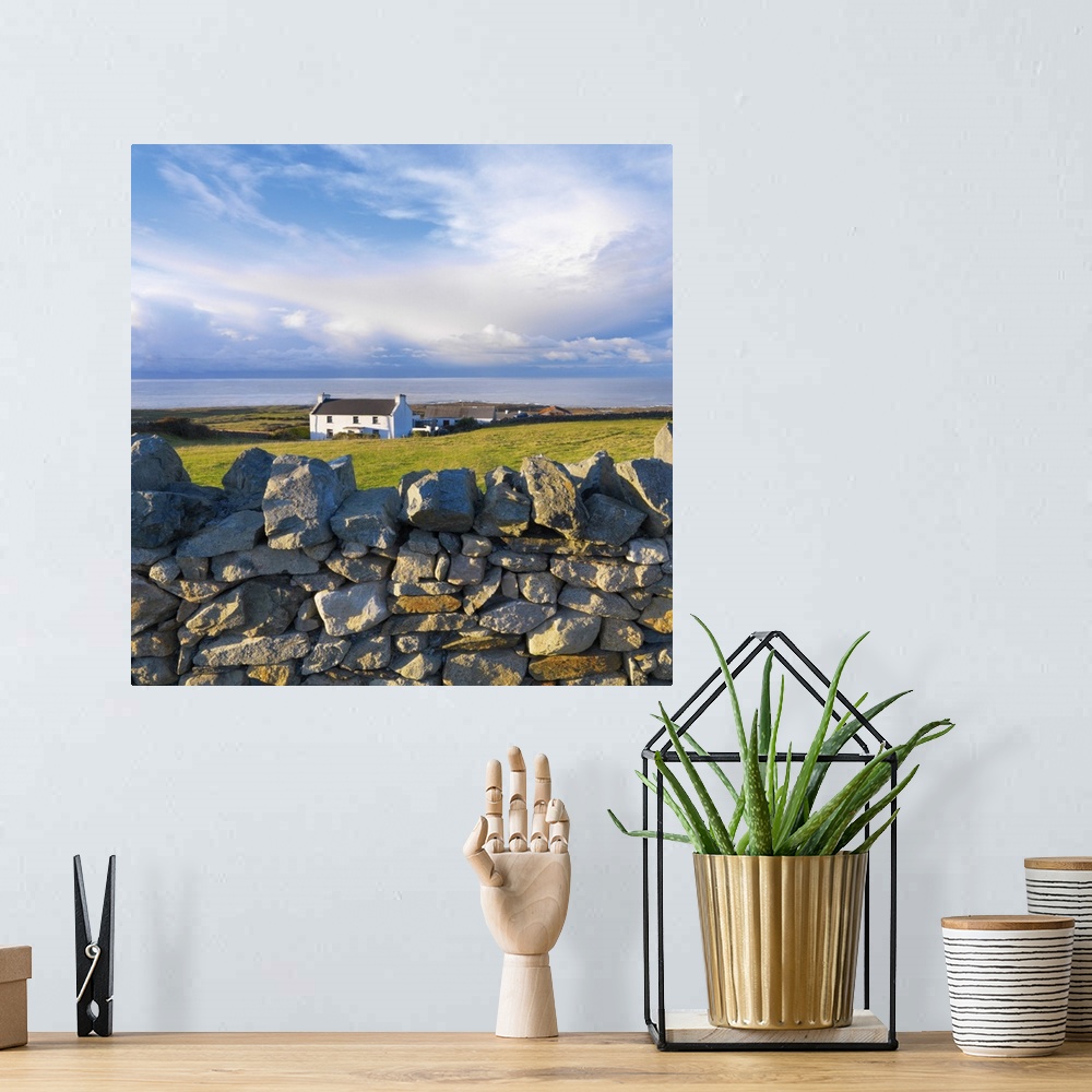 A bohemian room featuring Ireland, County Donegal, Fanad, House and stone wall.