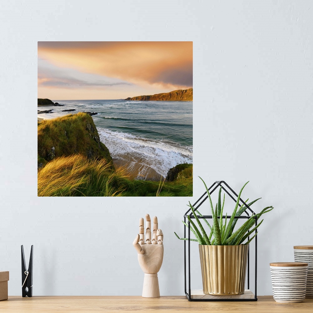 A bohemian room featuring Ireland, County Donegal, Inishowen, Doagh beach at dusk.