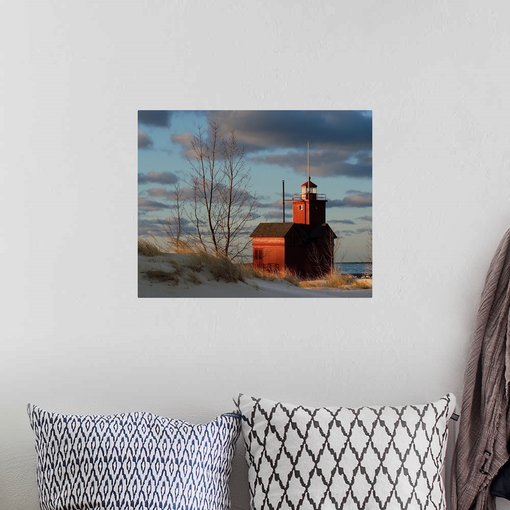 A bohemian room featuring Holland Michigan Lighthouse with a sunrise
