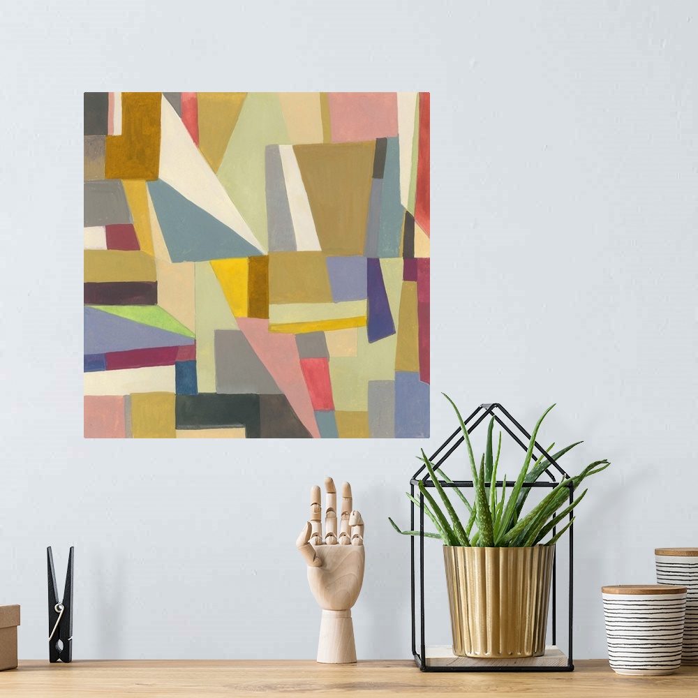 A bohemian room featuring One painting in a series of geometric abstracts with mostly muted colors depicting the artist's i...