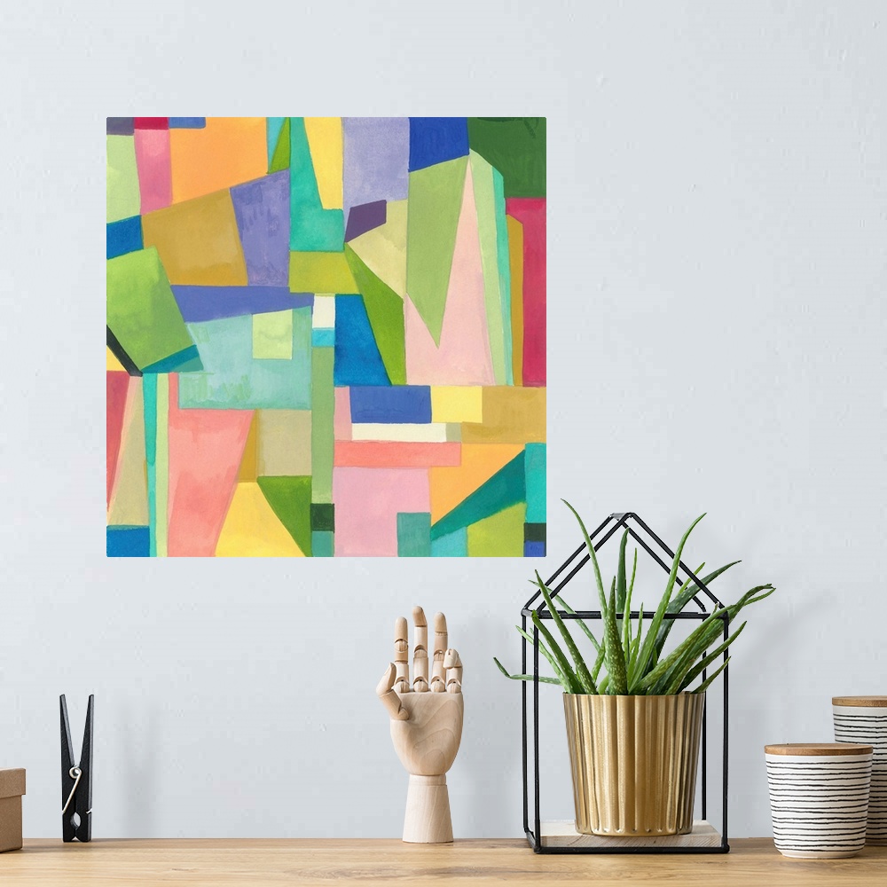 A bohemian room featuring One painting in a series of geometric abstracts in vibrant colors depicting the artist's interpre...