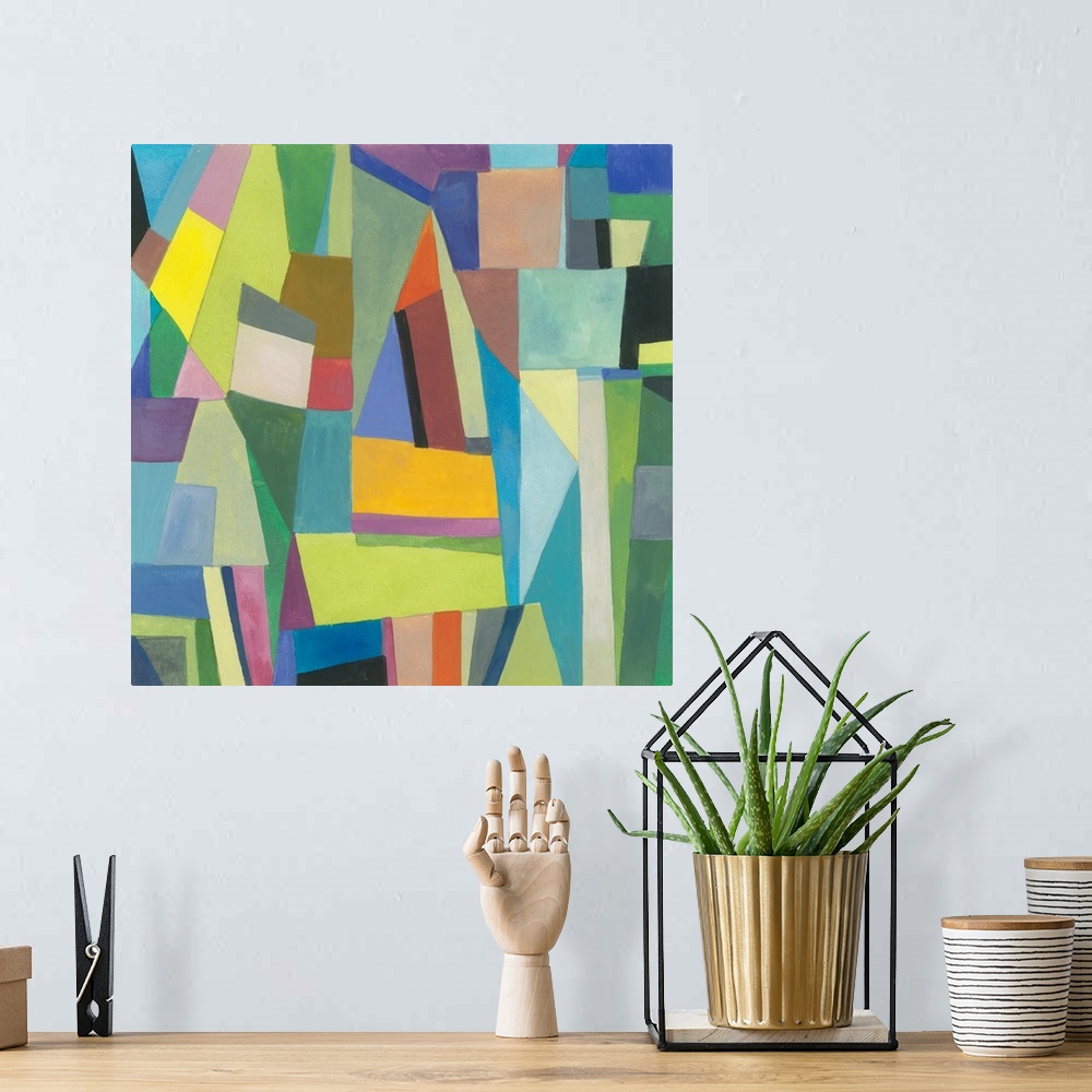 A bohemian room featuring One painting in a series of geometric abstracts in various colors depicting the artist's interpre...