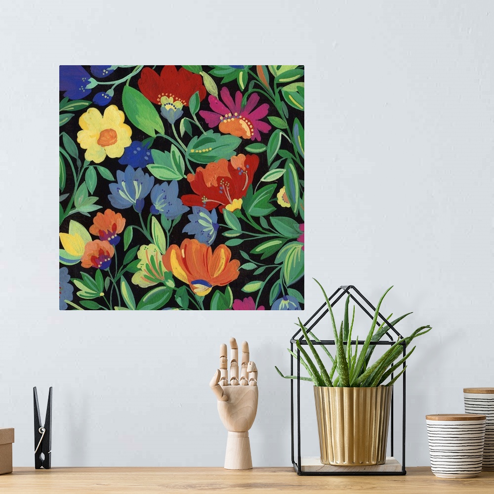 A bohemian room featuring Painting of warm-colored flowers and green leaves against a black background.