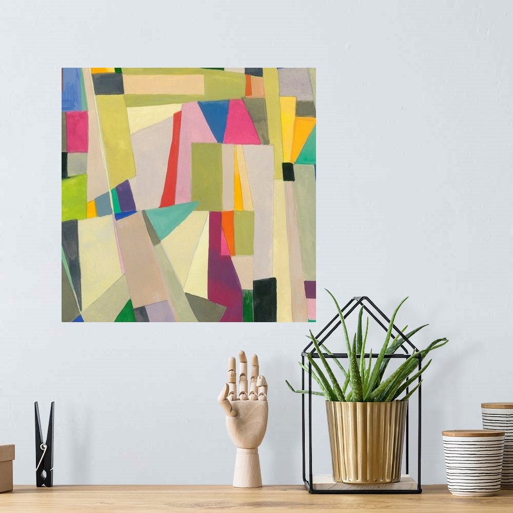 A bohemian room featuring One painting in a series of geometric abstracts with some subdued colors depicting the artist's i...