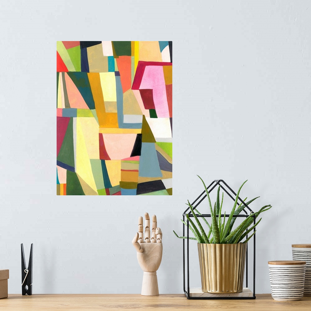 A bohemian room featuring One painting in a series of geometric abstracts with soothing shades of pink and green depicting ...
