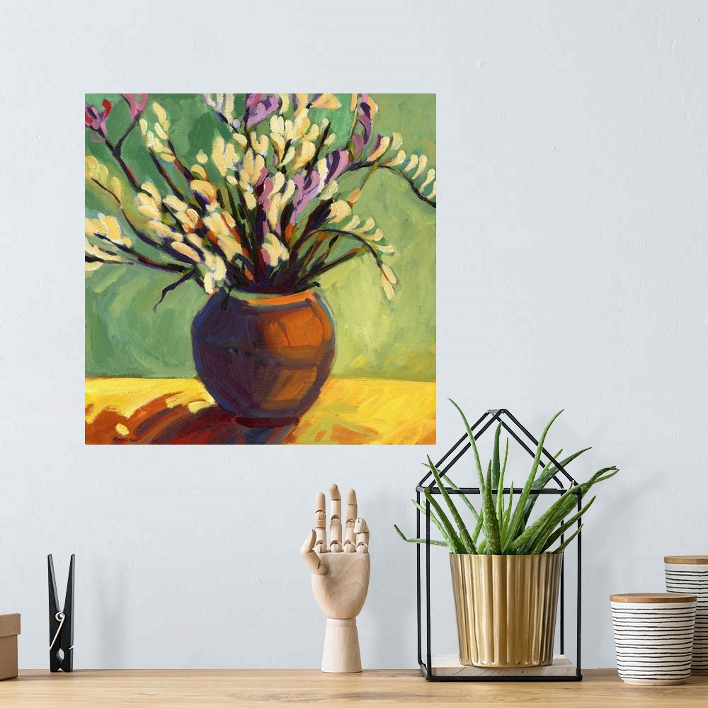 A bohemian room featuring A square painting of a vase of flowers in vibrant brush strokes.