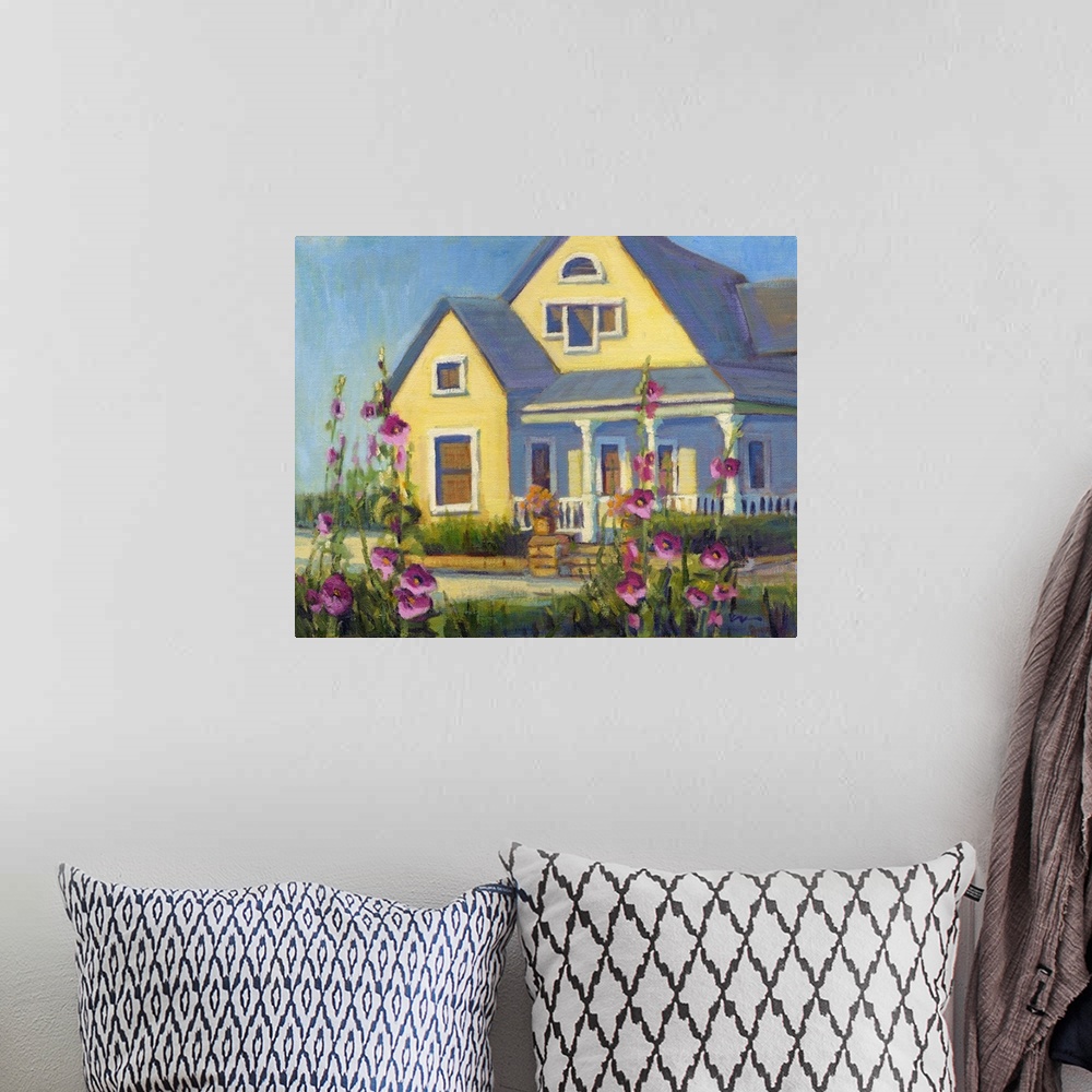 A bohemian room featuring A contemporary painting of a yellow house with pink flowers in a garden.
