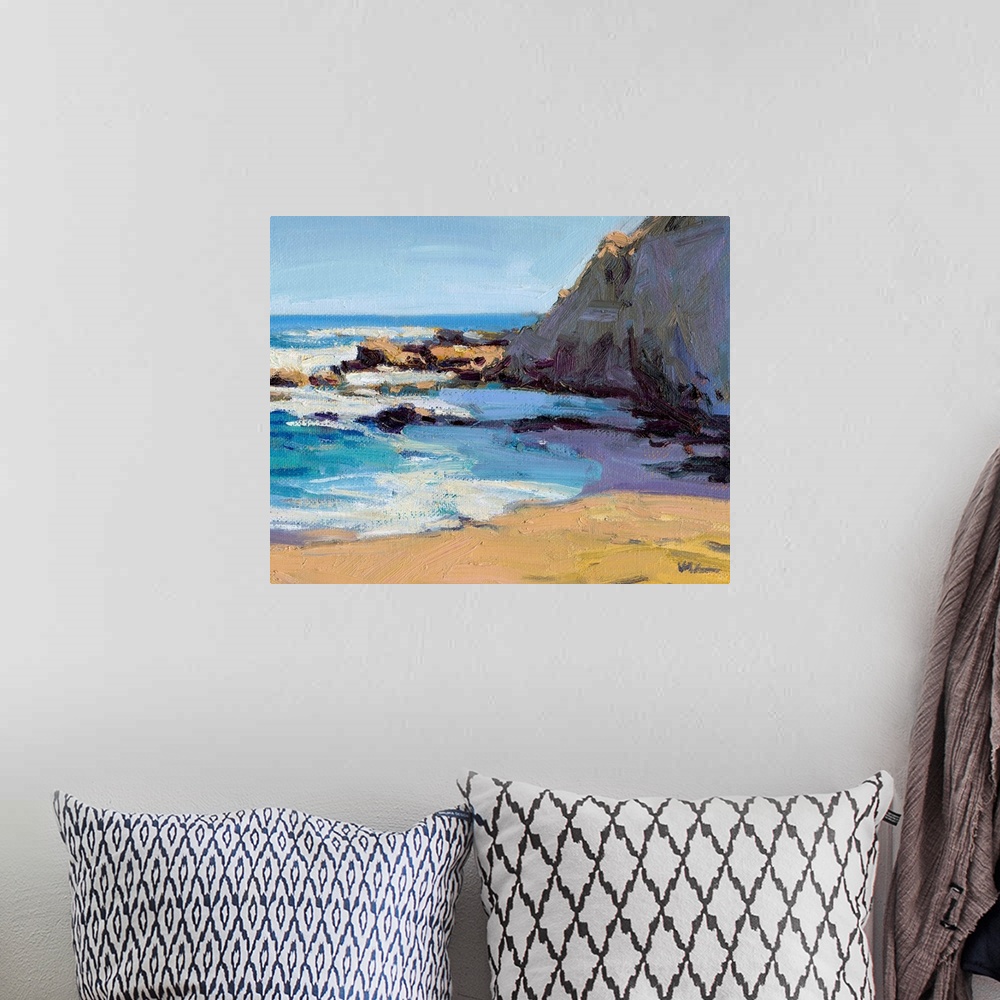 A bohemian room featuring Contemporary painting of a rocky beach with vivid blue water.