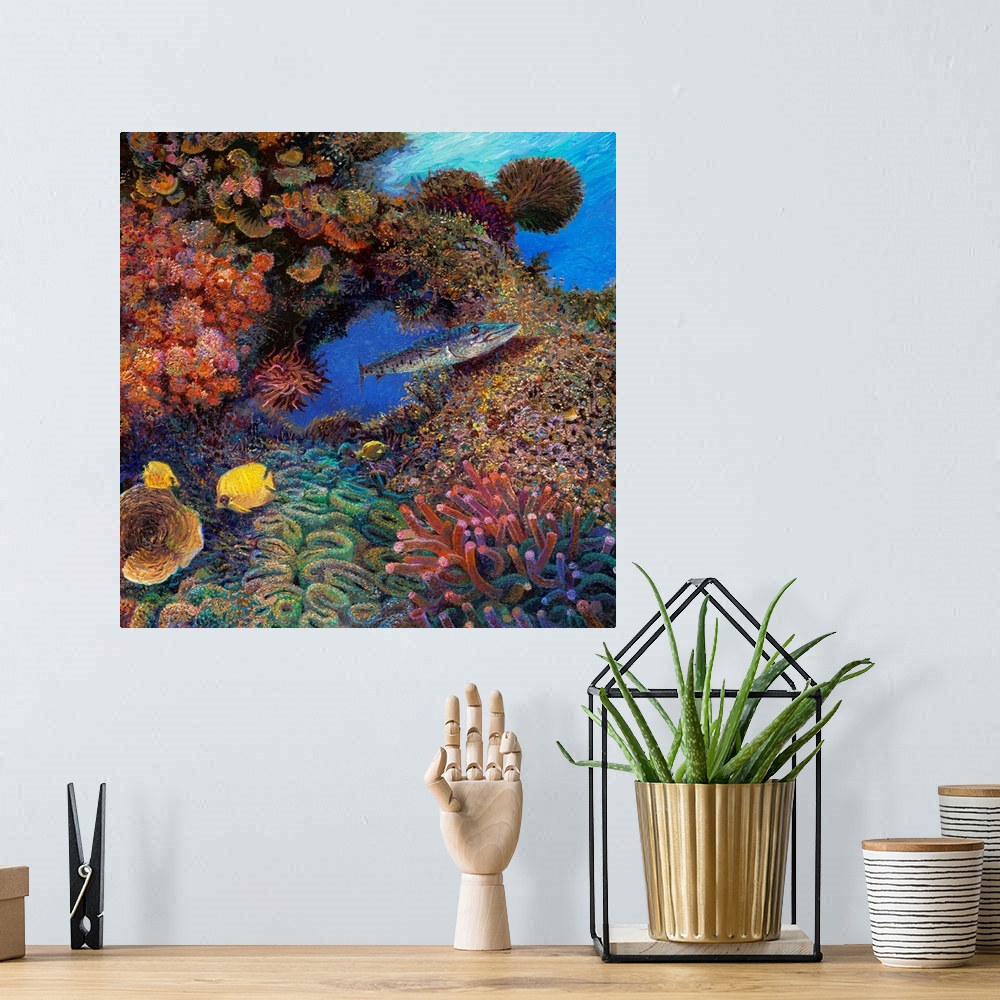 A bohemian room featuring Brightly colored contemporary artwork of a barracuda swimming through coral.