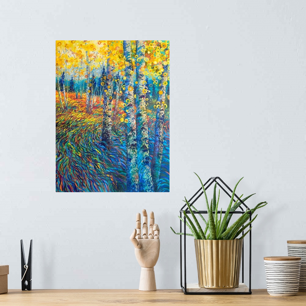 A bohemian room featuring Brightly colored contemporary artwork of a colorful tree landscape.