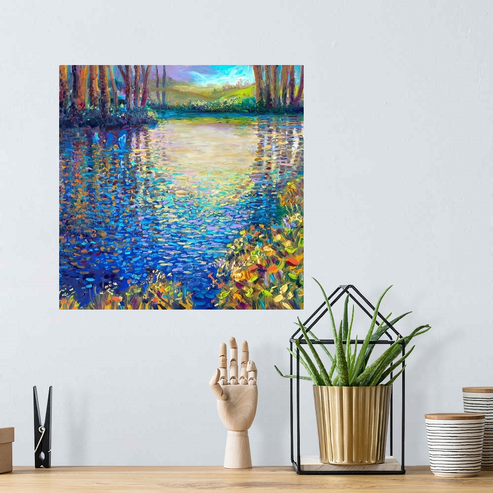 A bohemian room featuring Brightly colored contemporary artwork of a landscape with a pond.
