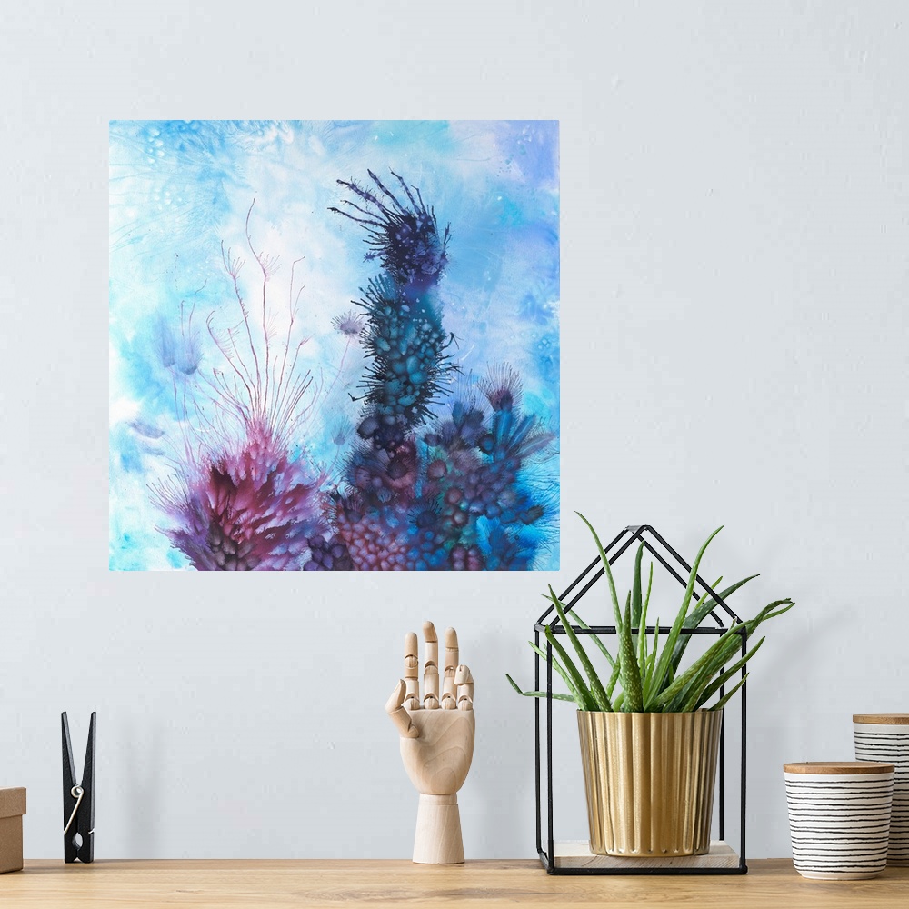 A bohemian room featuring Brightly colored contemporary artwork of a blue and purple blow paint.