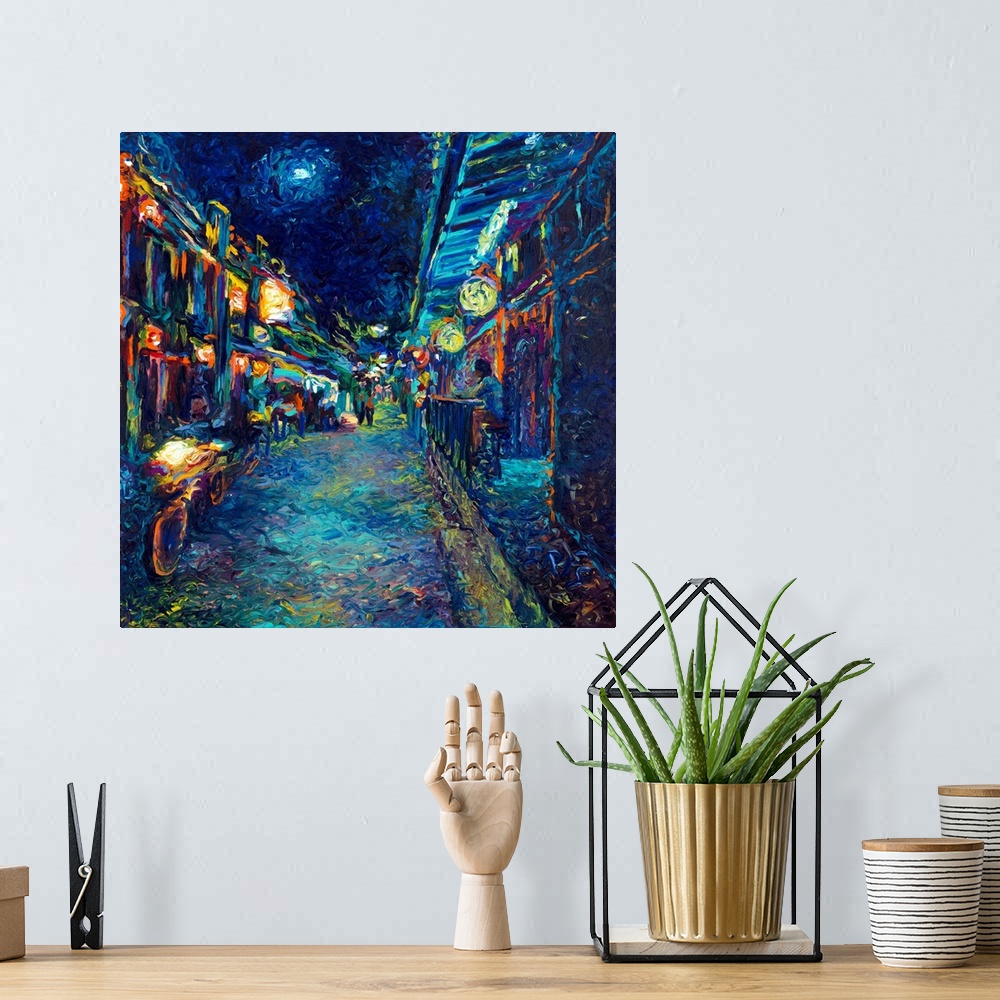 A bohemian room featuring Brightly colored contemporary artwork of an alley view street.