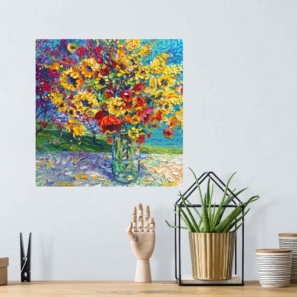 A bohemian room featuring Brightly colored contemporary artwork of a painting of red and yellow flowers in a vase.