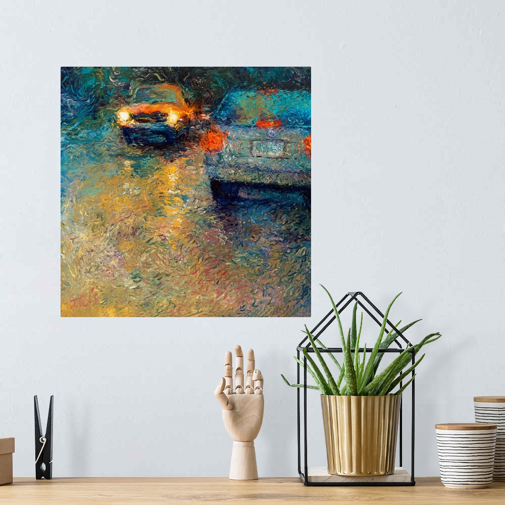 A bohemian room featuring Brightly colored contemporary artwork of a blue and a yellow car passing each other.