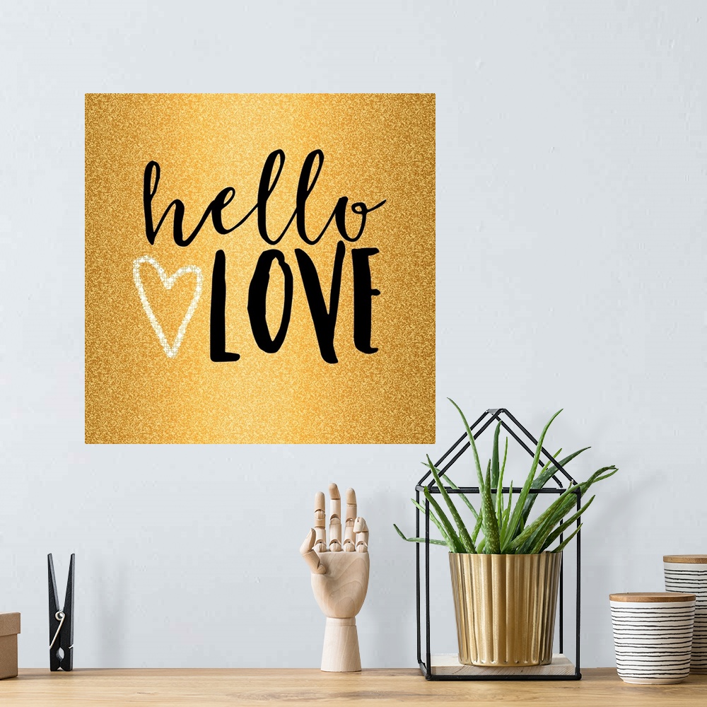A bohemian room featuring Black text and a heart design on gold.