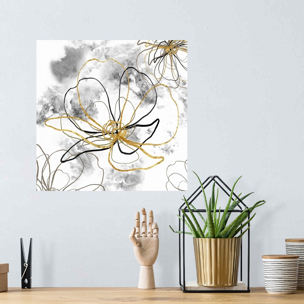 A bohemian room featuring Decorative artwork of outlined flowers in black and gold with gray blurred spots on a white backg...