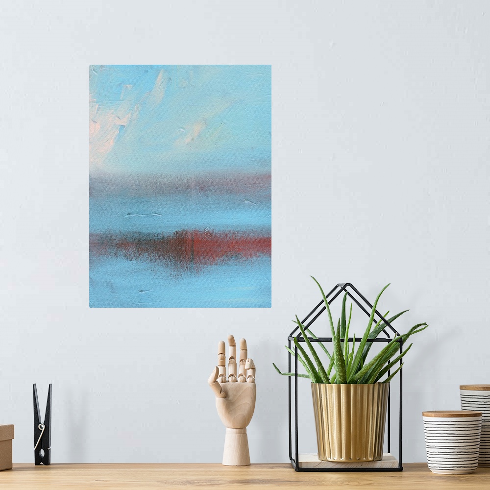 A bohemian room featuring Abstract painting in shades of red and blue, resembling clouds in the sky.
