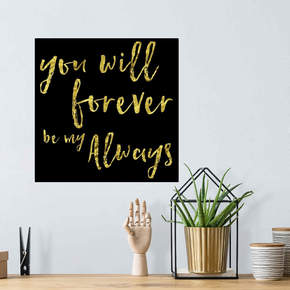 A bohemian room featuring Gold hand-lettered text on black.