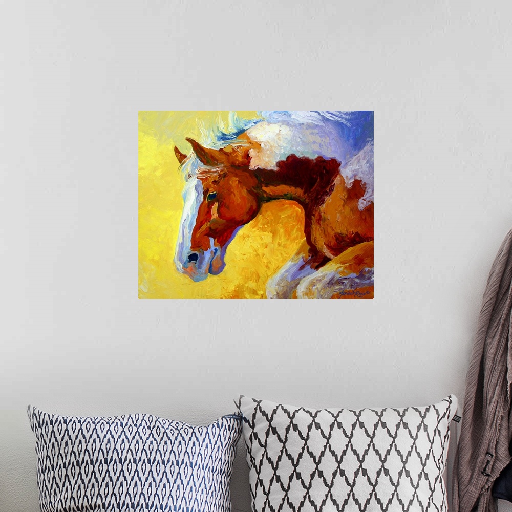 A bohemian room featuring A brightly colored contemporary painting of a charging Paint stallion, his neck arched as he gall...
