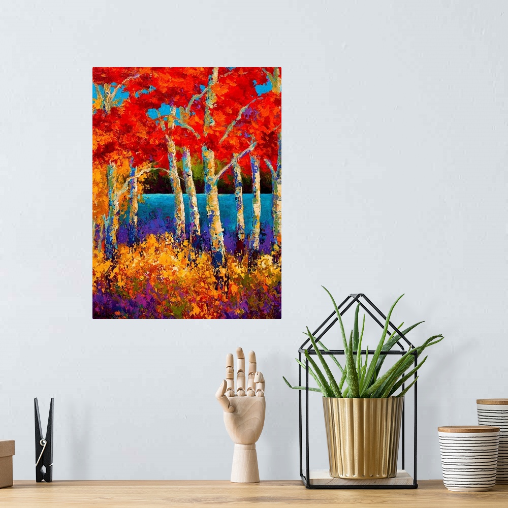 A bohemian room featuring Vertical abstract painting of a forest made up of bright colors.
