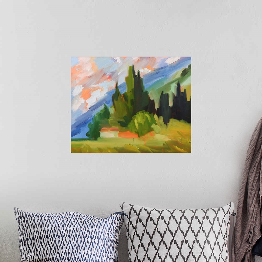 A bohemian room featuring Hillside scene in Tuscany with colorful sky and trees.