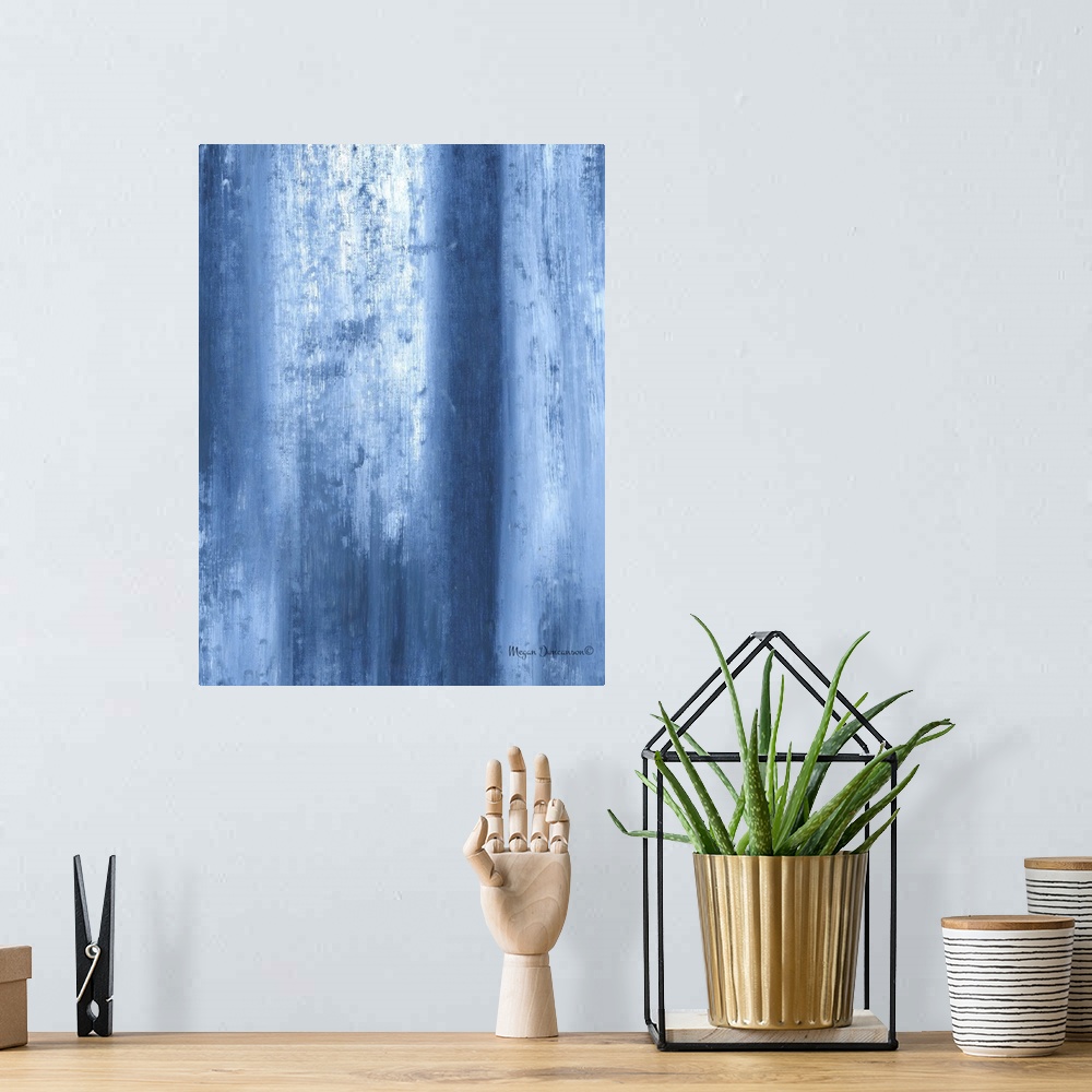 A bohemian room featuring A contemporary abstract painting that has fading blue tones and white running vertically and gent...