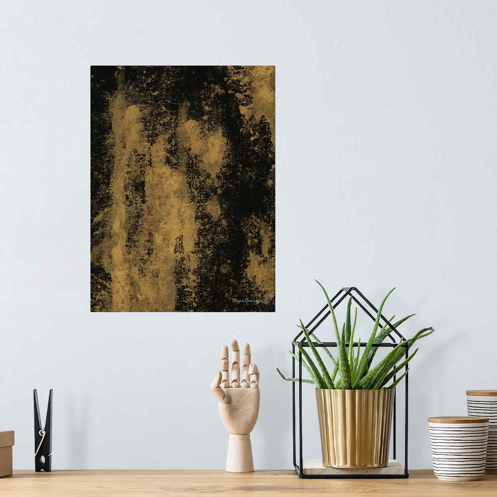 A bohemian room featuring A contemporary abstract painting that has a deep gold background and a black overlay.