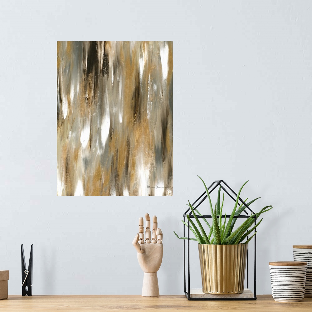 A bohemian room featuring A contemporary abstract painting that has a variety of brown and gold tones along with a little b...