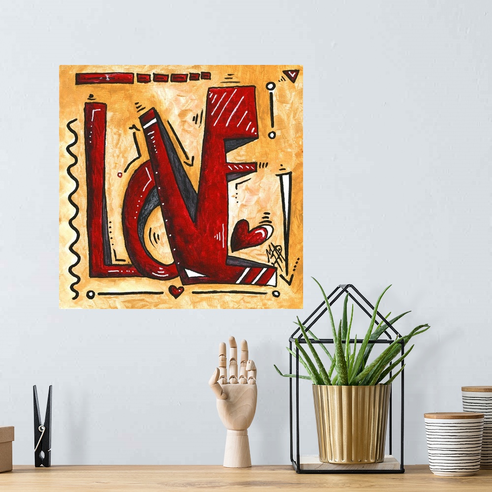 A bohemian room featuring Pop art of the word "Love" in red with hearts on a golden background.