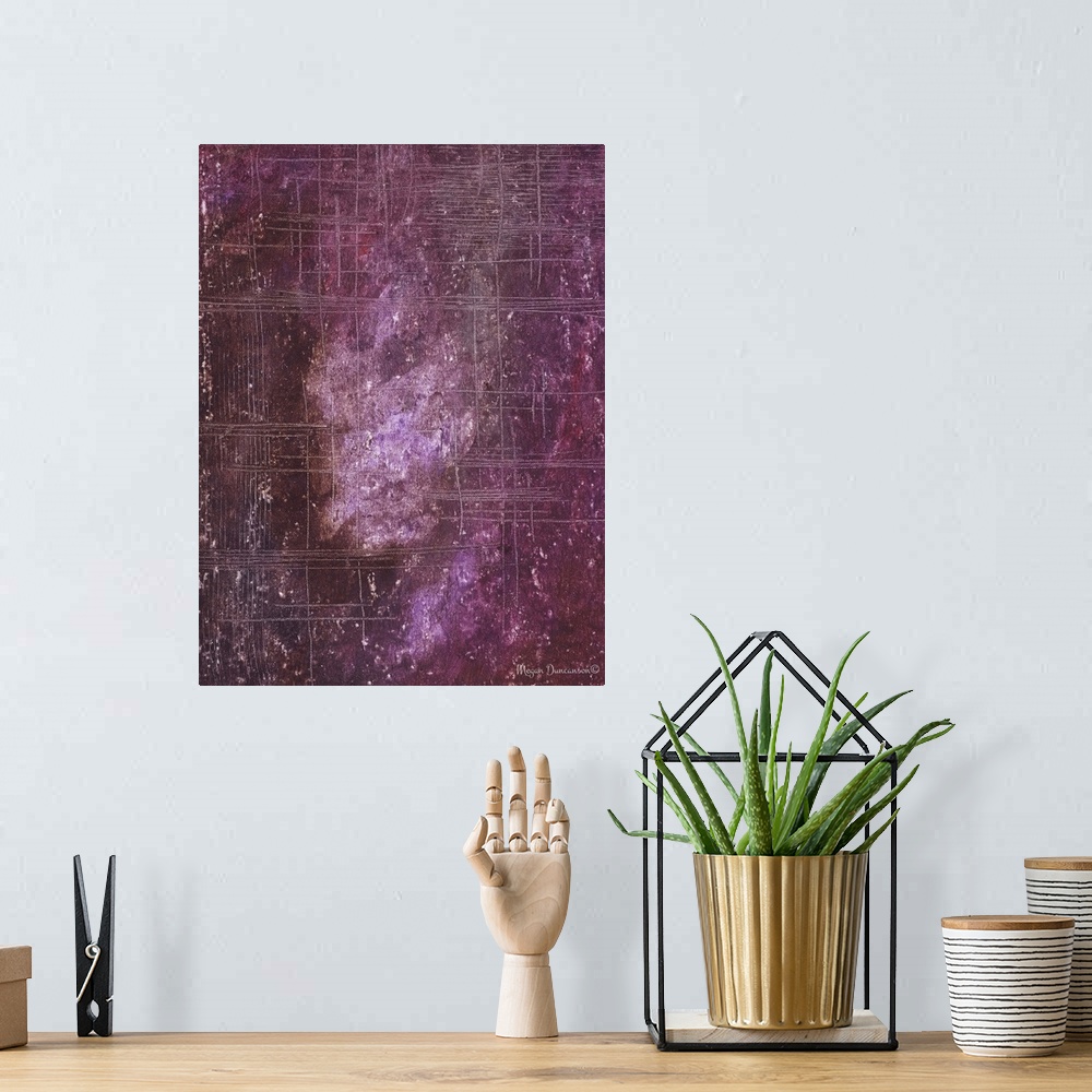 A bohemian room featuring A contemporary abstract painting that has different shades of pink and purple throughout with hin...