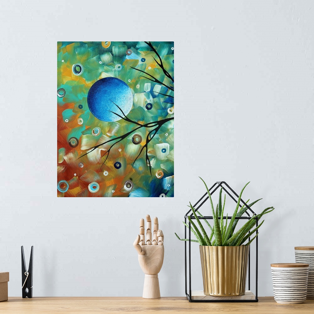 A bohemian room featuring Contemporary abstract image of the moon and tree branch silhouettes.  The background is colorful,...
