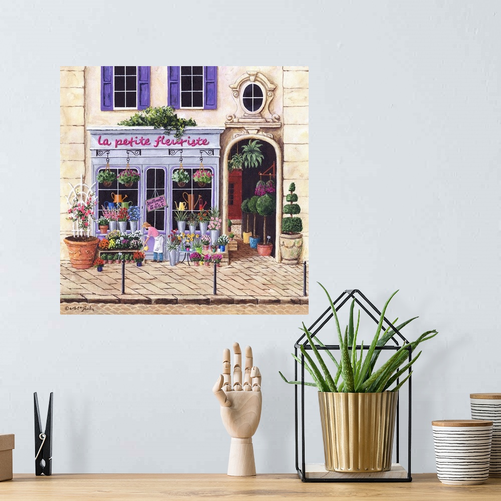 A bohemian room featuring Painting of a Parisian flower shop storefront.