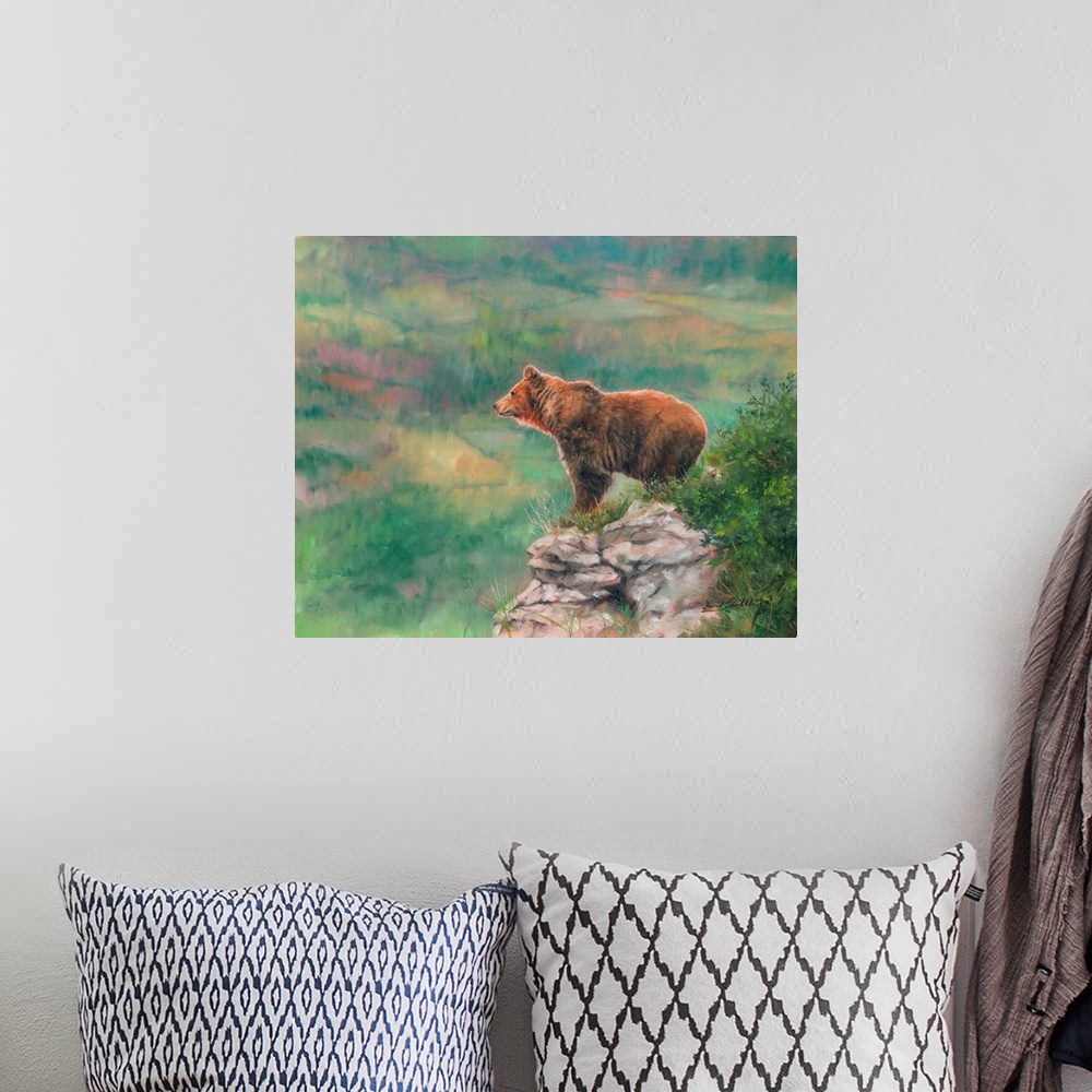 A bohemian room featuring Contemporary painting of a brown bear atop a rocky overlook.