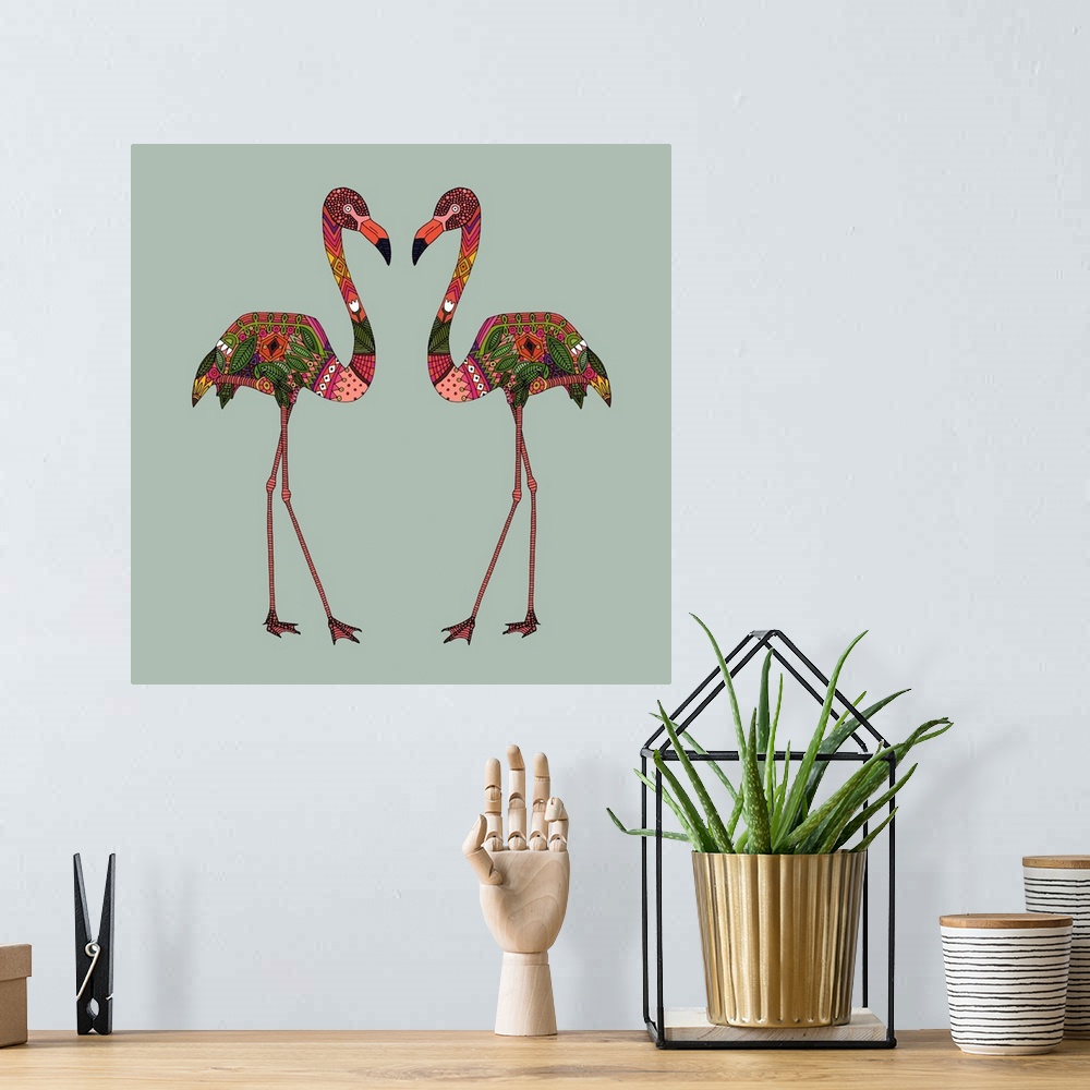 A bohemian room featuring A pair of pink flamingos with colorful patterns.