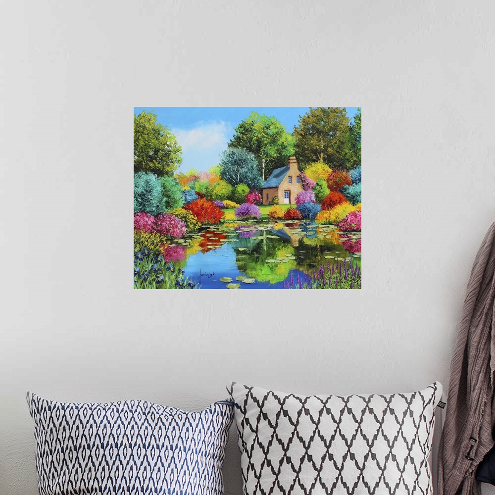A bohemian room featuring Colorful painting of a rural cottage surrounded multi-colored foliage.