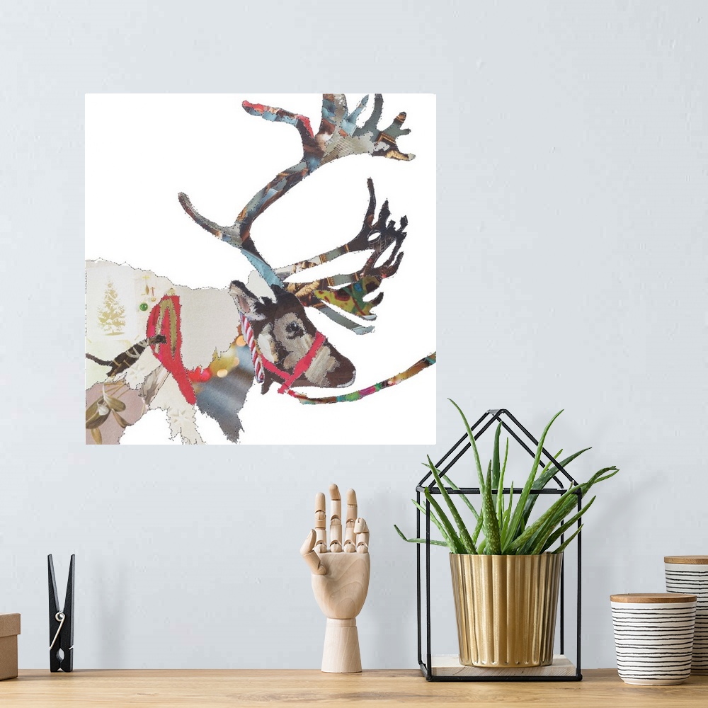A bohemian room featuring Square artwork of a reindeer in a collage style outlined in stitches.