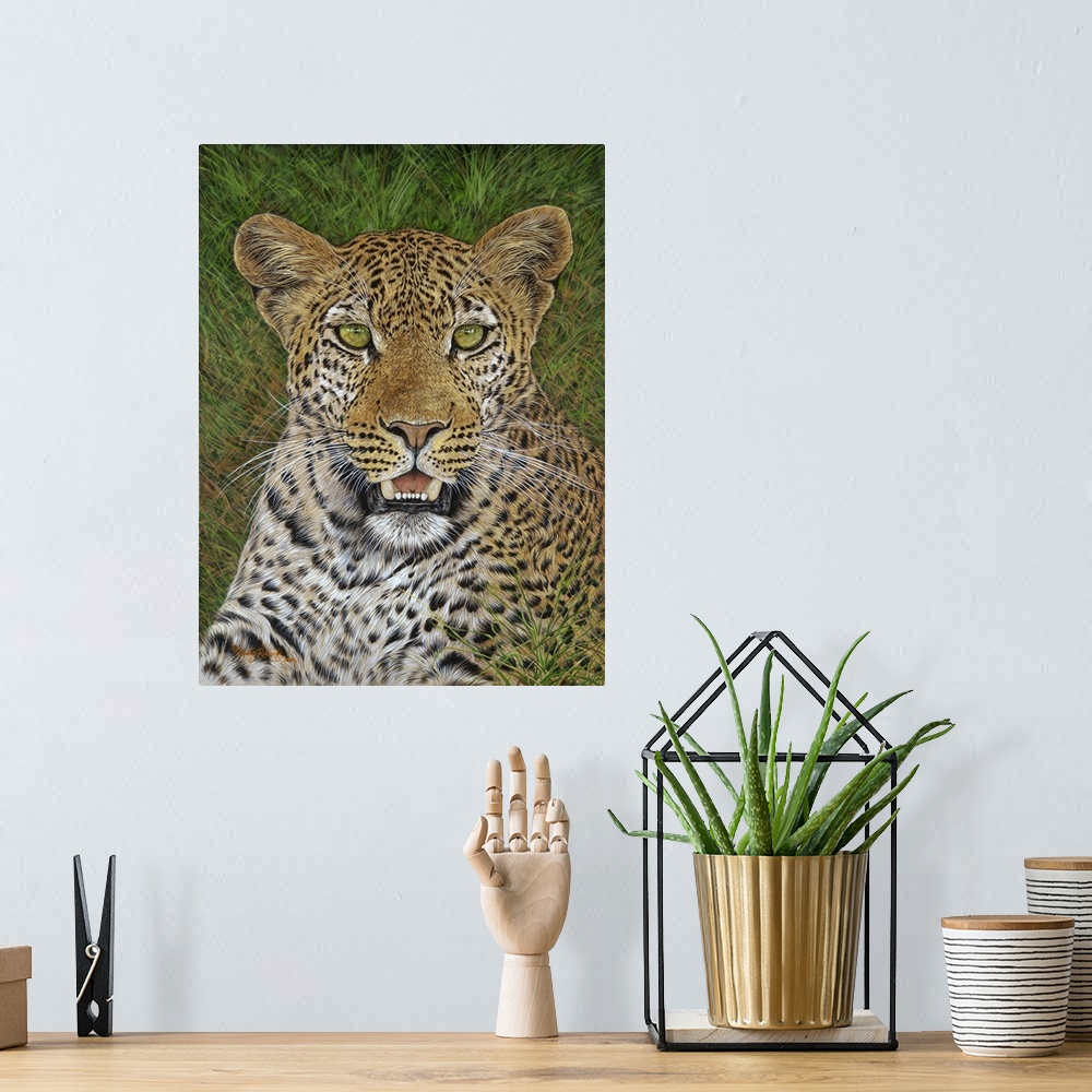 A bohemian room featuring Contemporary artwork of leopard laying in lush grass.