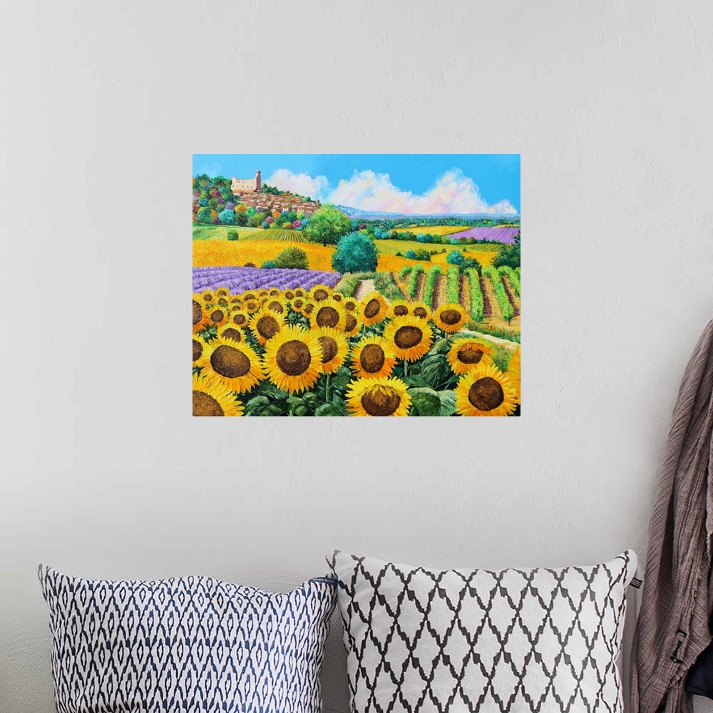 A bohemian room featuring Painting of a countryside field of massive yellow sunflowers and rows of vineyards,