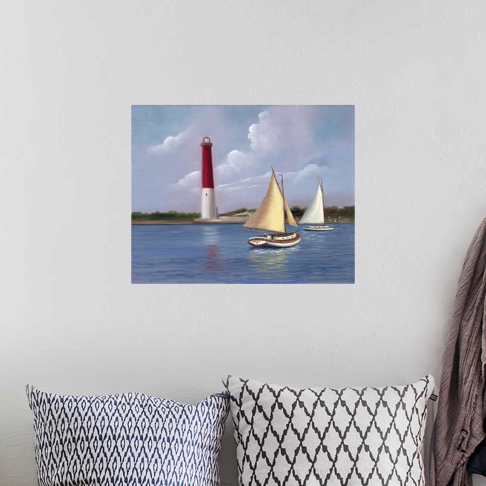 A bohemian room featuring Painting of two sailboats on the water near a red and white lighthouse.