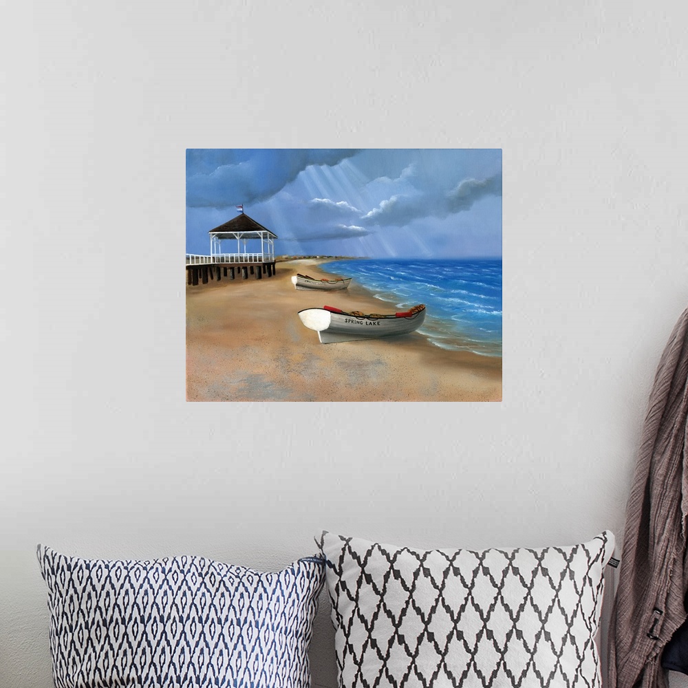 A bohemian room featuring Painting of boats on the sand by a pier on the coast.