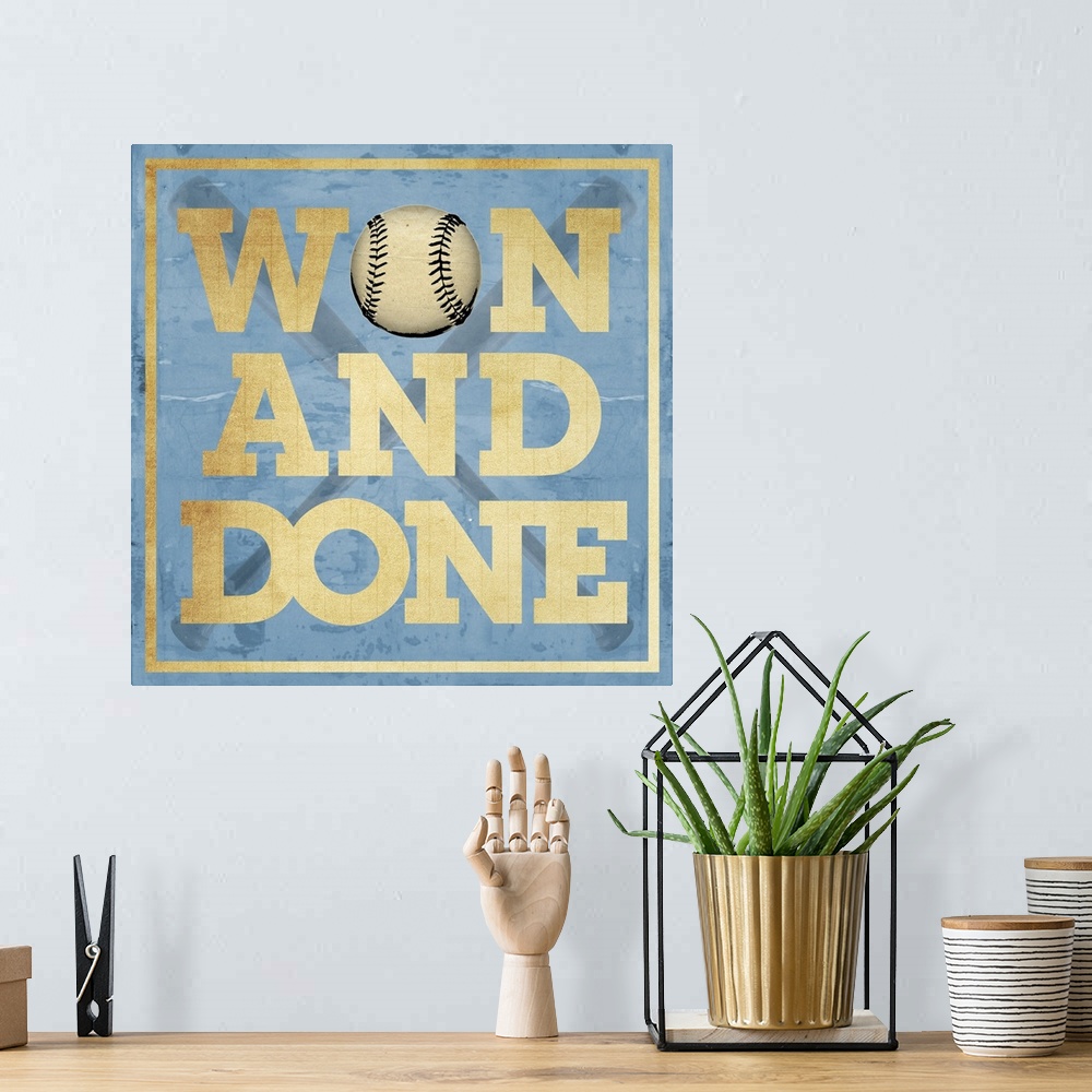 A bohemian room featuring Won and Done Typography Art - Blue