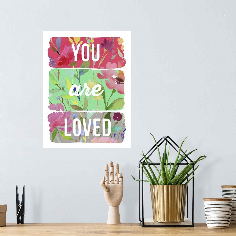 A bohemian room featuring You are Loved planks