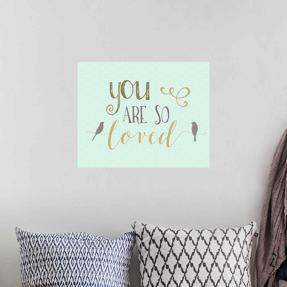A bohemian room featuring Contemporary handlettering style artwork.