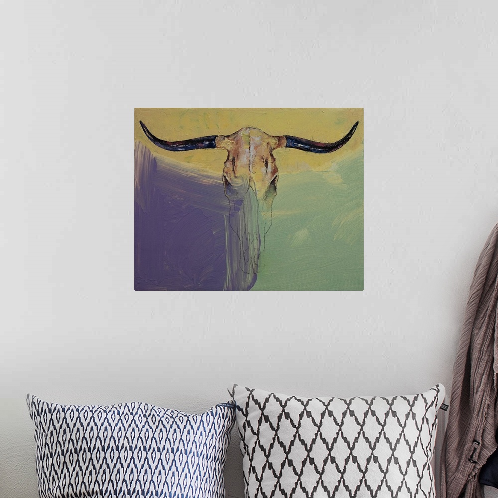 A bohemian room featuring A contemporary painting of a bull skull against a colorful background.