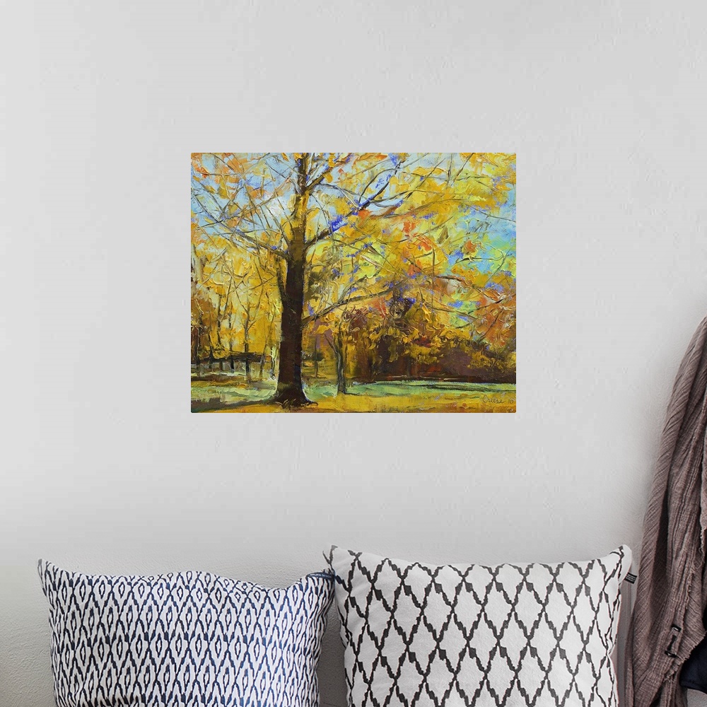 A bohemian room featuring Large contemporary art depicts a park filled with trees going through the color changes of Fall. ...
