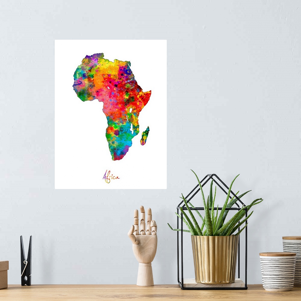 A bohemian room featuring A watercolor map of Africa.